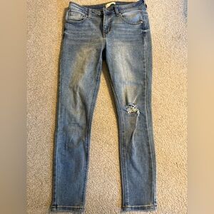 Women’s Blue Distressed Jeans